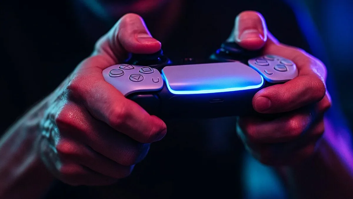 Gamer Hands Holding PS5 Controller During PS5 Price Increase